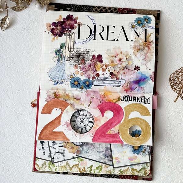 Bullet journal couverture annuelle 2026 avec masking tapes fleuris