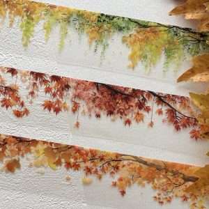 Trois masking tapes PET transparents décorés de branches et feuillages d'automne aux couleurs vertes, jaunes, orangées et rouges
